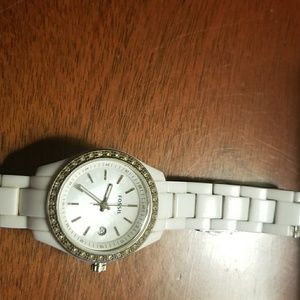 White Fossil watch.